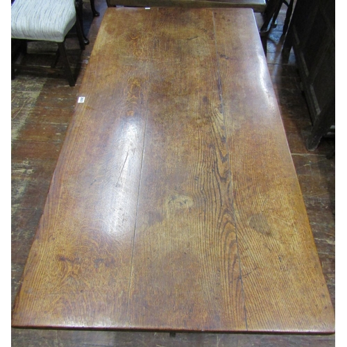 2651 - 19th century oak refectory table, the plank top raised on shaped supports with pegged frame, united ... 