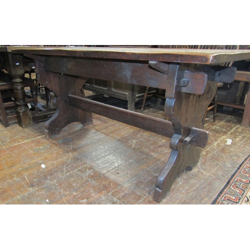 2651 - 19th century oak refectory table, the plank top raised on shaped supports with pegged frame, united ... 