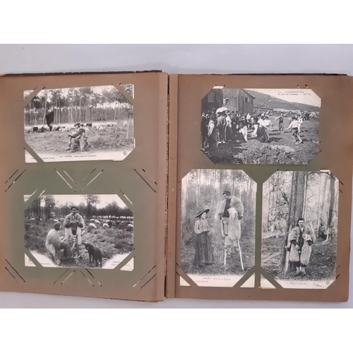 300 - Four post card albums containing black and white postcards in the main French/Belgian, together with... 