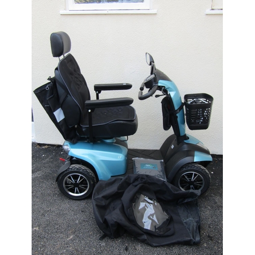 2548 - A Careco Corvus Rapide mobility scooter in a turquoise colourway with eight mph capacity complete wi... 