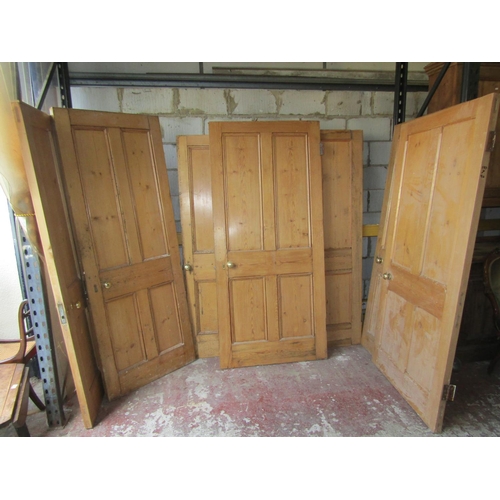 2558 - Seven stripped and waxed pine panelled doors all 19th century, all internal, various sizes