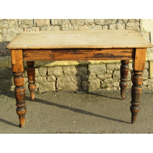 2558A - A late Victorian scrubbed pine kitchen table raised on turned supports (lacks frieze drawer, AF) 4ft... 