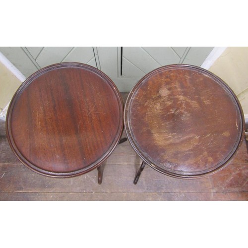 2574A - A pair of reproduction Georgian style mahogany torcheres on tripod bases, 90cm high