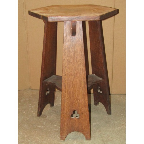 2654 - An arts and crafts bobbin and bar back elbow chair in birch and elm, with embossed leather panels wi... 