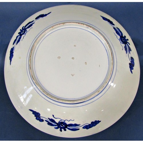 1071 - A 19th century oriental blue and white charger or wall plate with finch, prunus, hawthorn and fence ... 