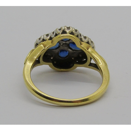 1241 - 18ct sapphire and diamond quatrefoil cluster ring, maker 'JHL', size P, 5.7g