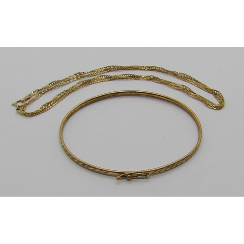 1265 - 9ct fine link chain necklace and a 9ct bangle, 5.9g total