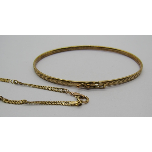 1265 - 9ct fine link chain necklace and a 9ct bangle, 5.9g total