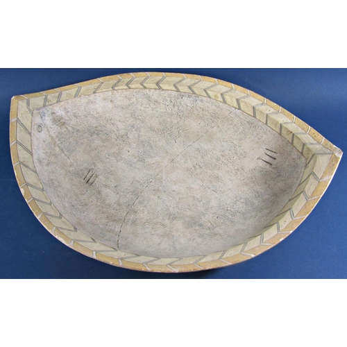 1124 - A large ovoid shaped studio pottery dish set within two herring bone bands and central panel with ab... 