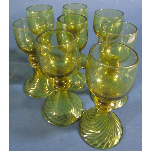 1140 - Fifteen near matching pale olive green spiral beehive wine glasses of varying sizes, and two similar... 