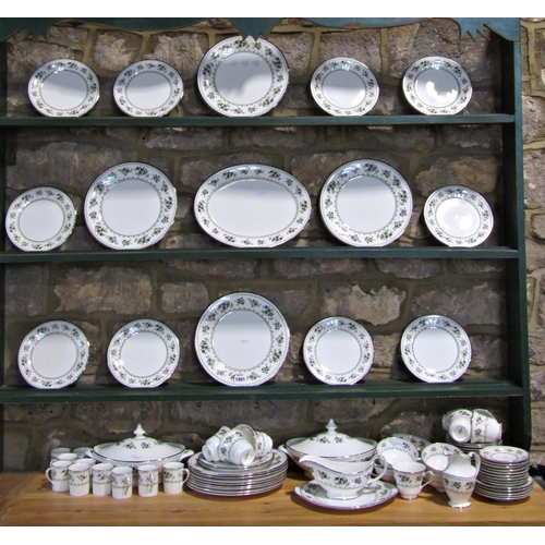 1001 - A collection of Royal Doulton bone china dinner and tea wares in the Valley Green pattern consisting... 