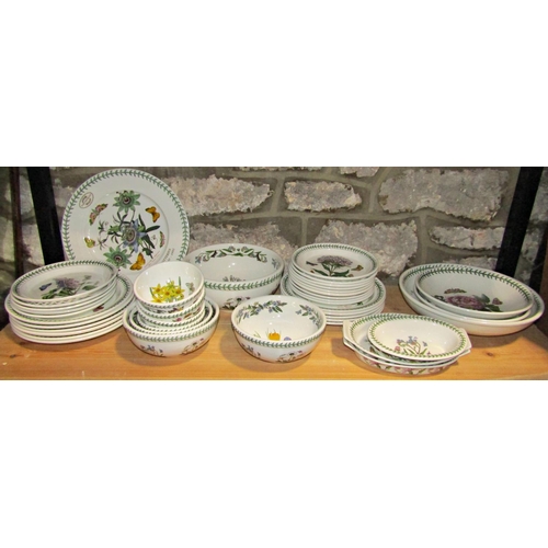 1003 - A collection of Portmeirion Botanic Garden china comprising dinner plates, tea plates, graduated bow... 