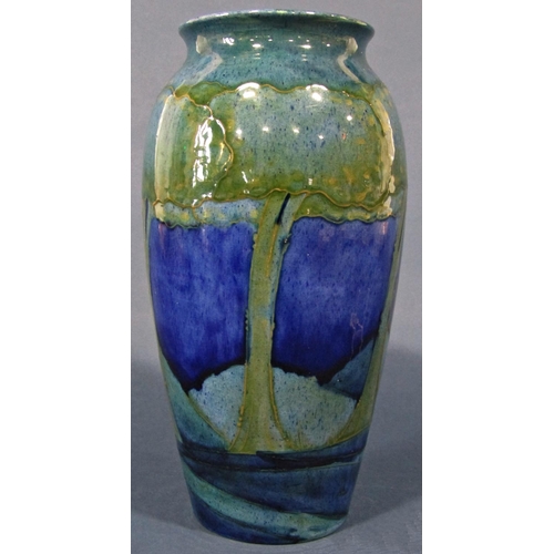 1035 - A Moorcroft oviform vase in the Moonlit Blue pattern, c.1925, signature to base, 26cm high