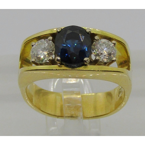 1281 - 18ct sapphire and diamond three stone ring, each diamond 0.20ct approx, size L/M, 8.4g