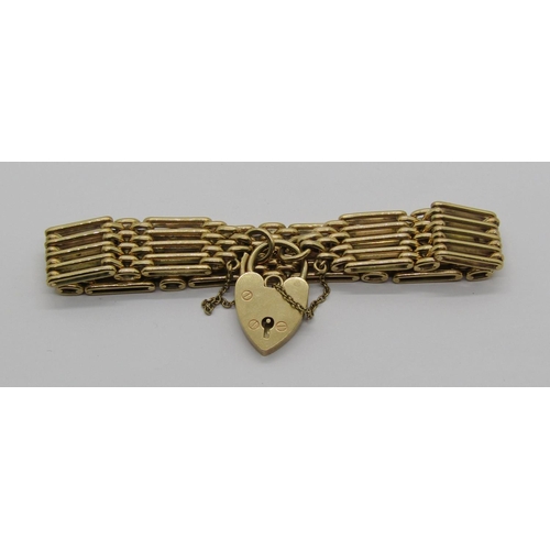 1296 - 1970s 9ct gate link bracelet with heart padlock clasp, 34.8g