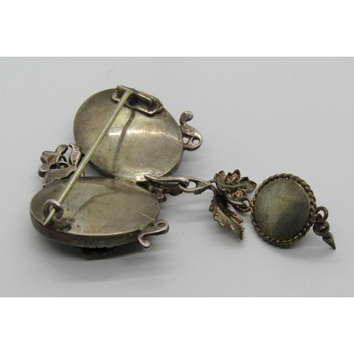 1311 - Austro-Hungarian white metal brooch with foiled red ground and detachable drop (af)