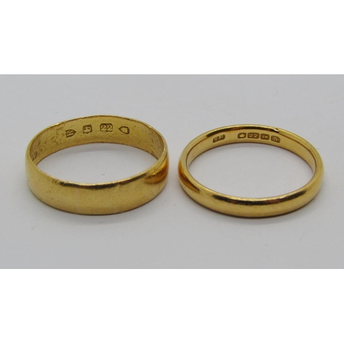 1318 - Two 22ct wedding rings; a late Victorian example, size M and a 1930s example, size L, 5.6g total