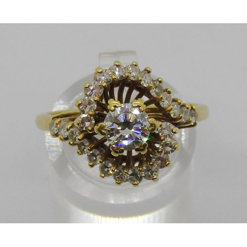 1322 - Impressive 18k vintage diamond cluster ring of stylised crossover design, centre stone 0.50cts appro... 