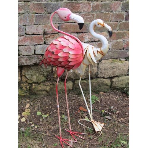 2005 - A painted and weathered composite garden ornament in the form of a pelican/stork seated on a rocky o... 