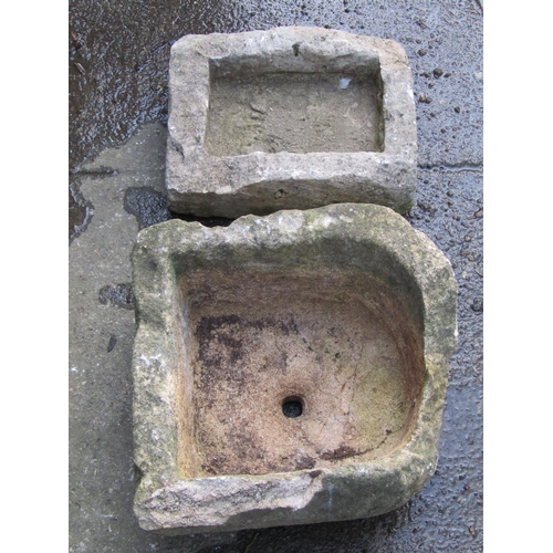 2010 - Two small weathered natural stone troughs of varying size and design (af), the rectangular example 3... 