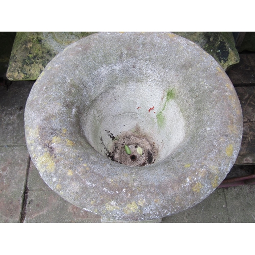 2027 - A painted and weathered cast composition stone garden urn with flared rim and partially lobed body w... 