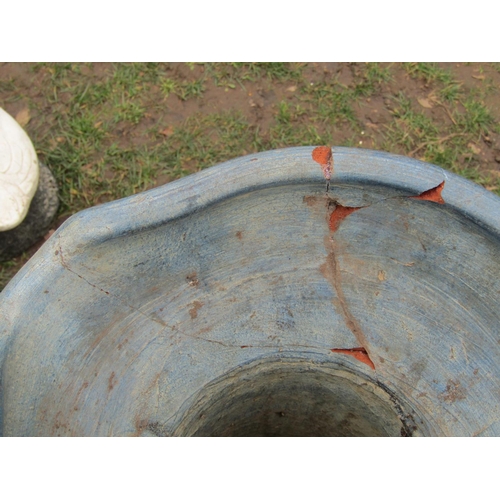 2042 - A large contemporary painted and incised terracotta pitcher with fan tailed fish, scrolled handle an... 