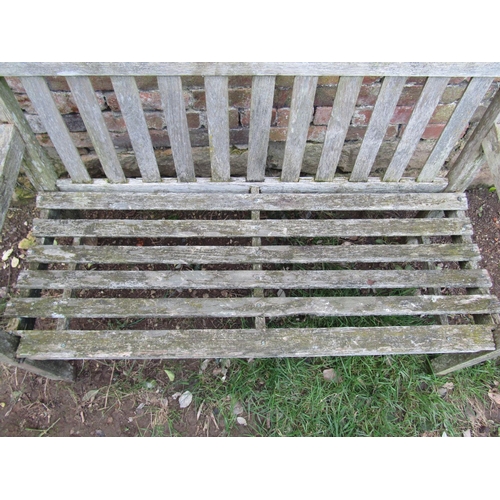 2043 - A vintage weathered teak two seat garden bench with slatted seat and back (af), 120 cm wide