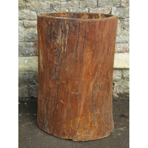 2072 - A chip carved hollowed out tree trunk planter 87 cm high