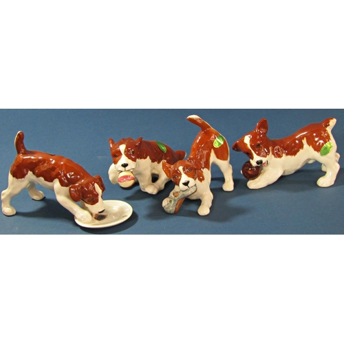 1069 - A collection of Beswick dogs, miniature hounds and terriers (7)