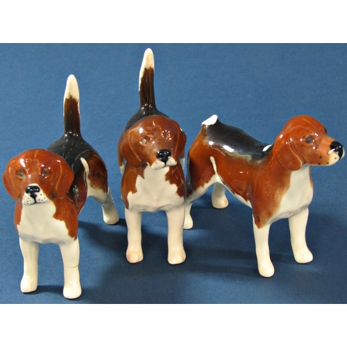 1069 - A collection of Beswick dogs, miniature hounds and terriers (7)