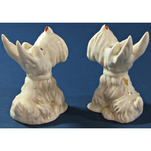 1070 - Four Beswick figures of white terriers, two with lady birds on their tails