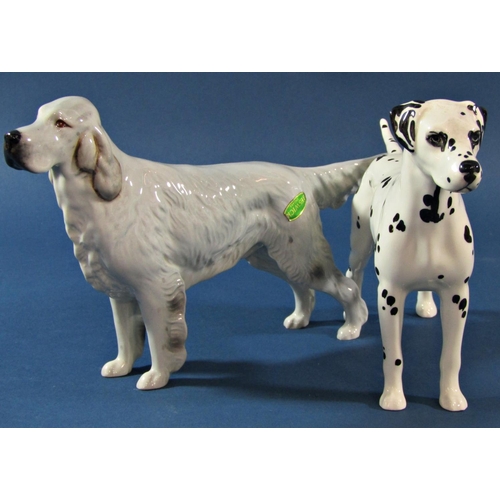 1072 - A collection of various Beswick dogs to include Bulldog, St Bernard, Dalmatian, Setter, etc (8)