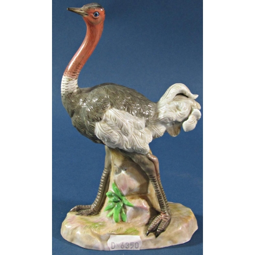 1076 - An unusual 19th century continental porcelain figure of an Ostrich, 19cm high