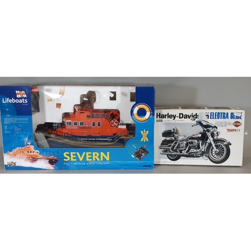 331 - Mixed lot of toys including kit model Harley-Davidson Electra Glide by IMAI, RNLI Lifeboats 'Severn'... 