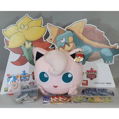 333 - Collection of Pokemon cards, counters and rule books together with a large Pokemon soft toy, 2 card ... 