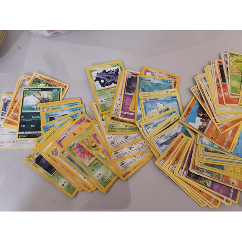 333 - Collection of Pokemon cards, counters and rule books together with a large Pokemon soft toy, 2 card ... 