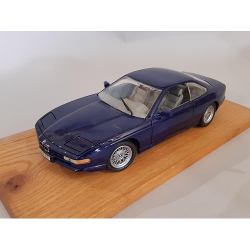 350 - 4 cased models of BMW cars comprising 1:18 scale 850i by Revell in timber/perspex case, BMW 507 by R... 