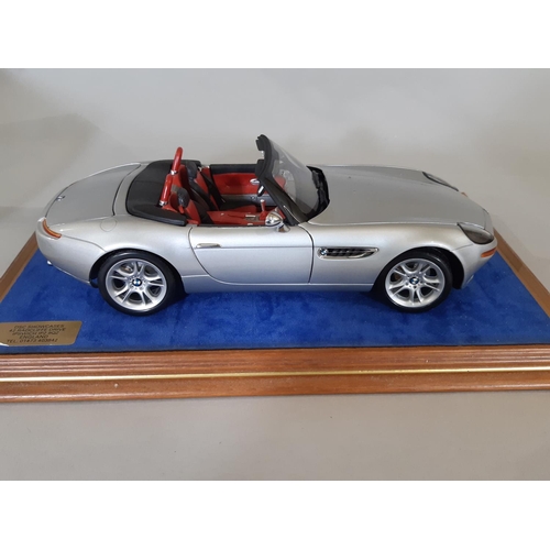 350 - 4 cased models of BMW cars comprising 1:18 scale 850i by Revell in timber/perspex case, BMW 507 by R... 