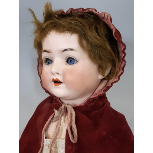 342 - 3 dolls: an early 20th century bisque head German character doll by Ernst Heubach with jointed compo... 