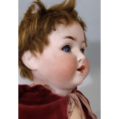 342 - 3 dolls: an early 20th century bisque head German character doll by Ernst Heubach with jointed compo... 