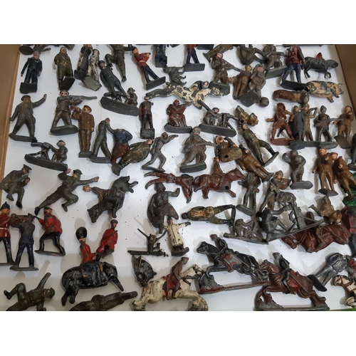 335 - Collection of early lead painted toy soldiers, most by Britians, together with Dinky vehicles and le... 