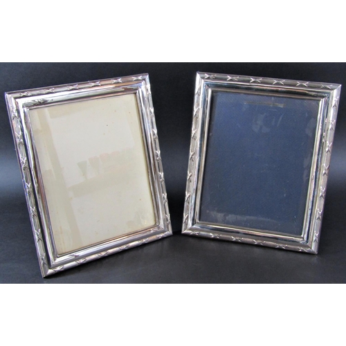 1206 - A pair of late 20th century silver photo frames,  24 cm x 19 cm opening, maker from Birmingham, make... 