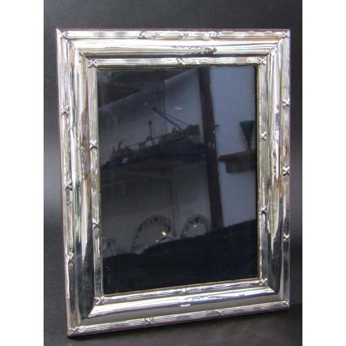 1209 - A 958 silver double ribbed photo frame, Birmingham 2005, 20 cm x 15 cm opening