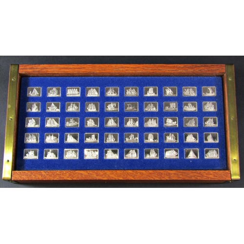 1217 - A Franklin Mint collection of Ships Of The World ingots, 50 - each 3 grams, housed in an oak box wit... 