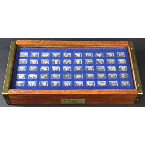 1217 - A Franklin Mint collection of Ships Of The World ingots, 50 - each 3 grams, housed in an oak box wit... 