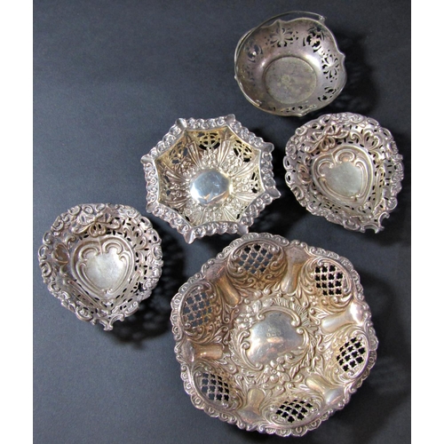 1222 - Five silver sweetmeat dishes of various shapes and sizes and a three piece condiment set including s... 