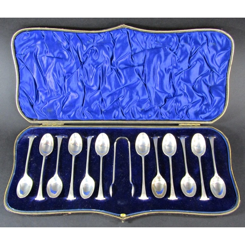 1231 - A cased set of twelve teaspoons and a sugar tong, silver cream jug, three mustard spoons, a thimble,... 