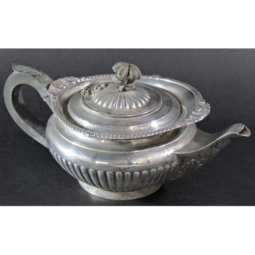 1238 - A Goldsmiths & Silversmiths squat silver teapot, London 1926, 12.5oz approx