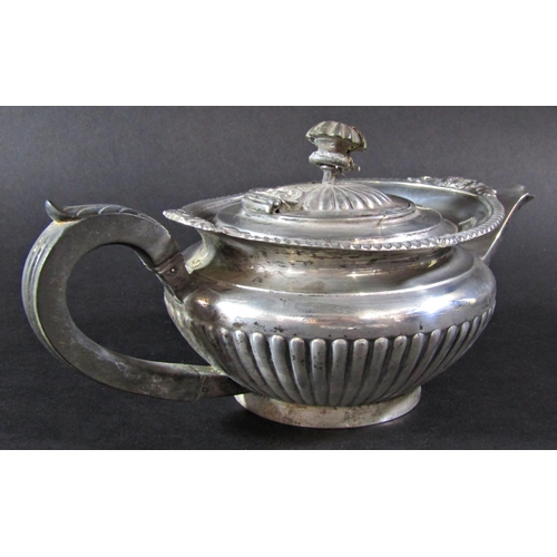 1238 - A Goldsmiths & Silversmiths squat silver teapot, London 1926, 12.5oz approx