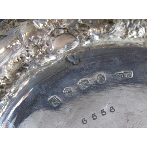 1239 - A Victorian silver tray, heavily engraved, raised on three supports, maker Elkington, Birmingham 186... 